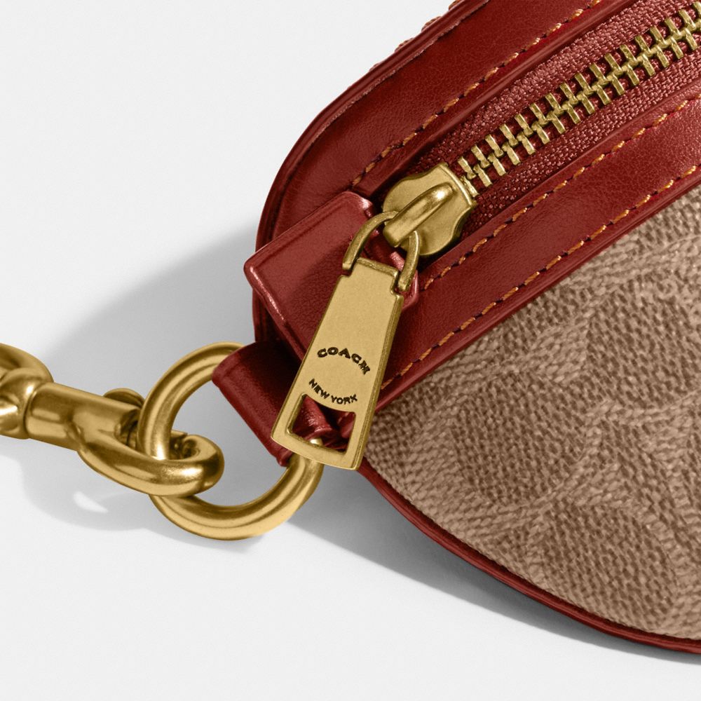 Riñonera COACH® Bethany In Signature Canvas Mujer Marrones Rojas | COYXC354