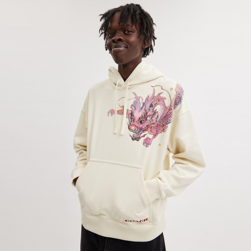 Sudadera con Capucha COACH® New Yearie Sweatshirt With Dragon Hombre Creme | CORVW928