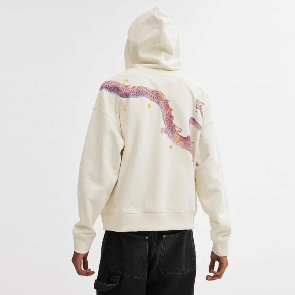 Sudadera con Capucha COACH® New Yearie Sweatshirt With Dragon Hombre Creme | CORVW928